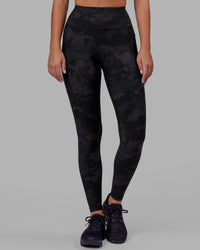 Woman wearing Rep Ultra High-Rise Full Length Legging Pockets - Black Camo | Model:Milly | Size:S