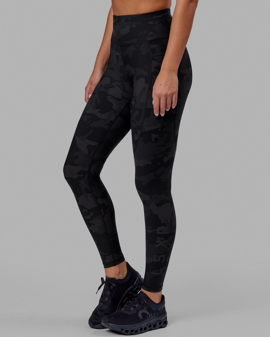 Woman wearing Rep Ultra High-Rise Full Length Legging Pockets - Black Camo | Model:Milly | Size:S