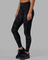 Woman wearing Rep Ultra High-Rise Full Length Legging Pockets - Black Camo | Model:Milly | Size:S