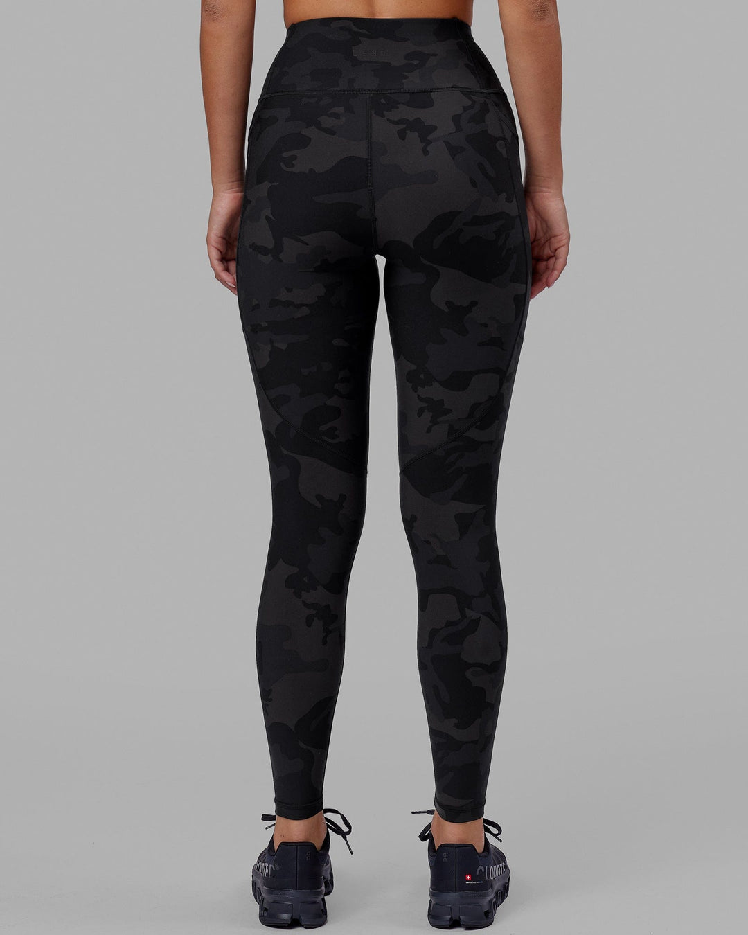 Woman wearing Rep Ultra High-Rise Full Length Legging Pockets - Black Camo | Model:Milly | Size:S