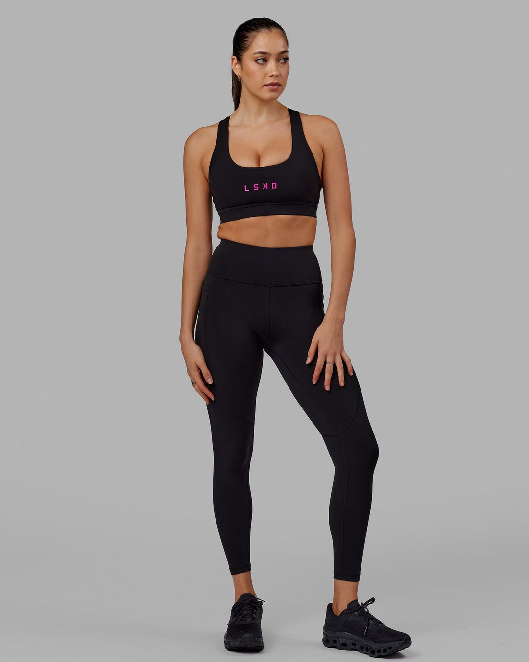 Woman wearing Rep Full Length Tight - Black-Neon Magenta