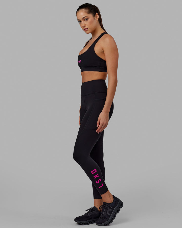 Woman wearing Rep Full Length Tight - Black-Neon Magenta
