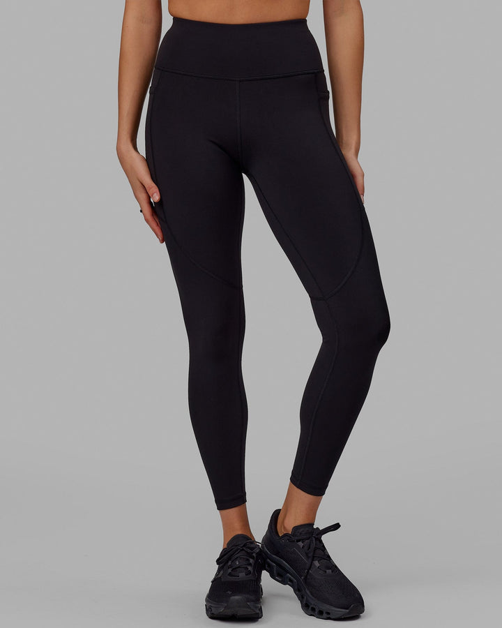 Woman wearing Rep Full Length Tight - Black-Neon Magenta