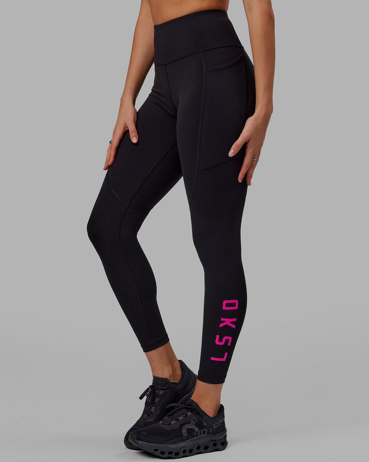 Woman wearing Rep Full Length Tight - Black-Neon Magenta