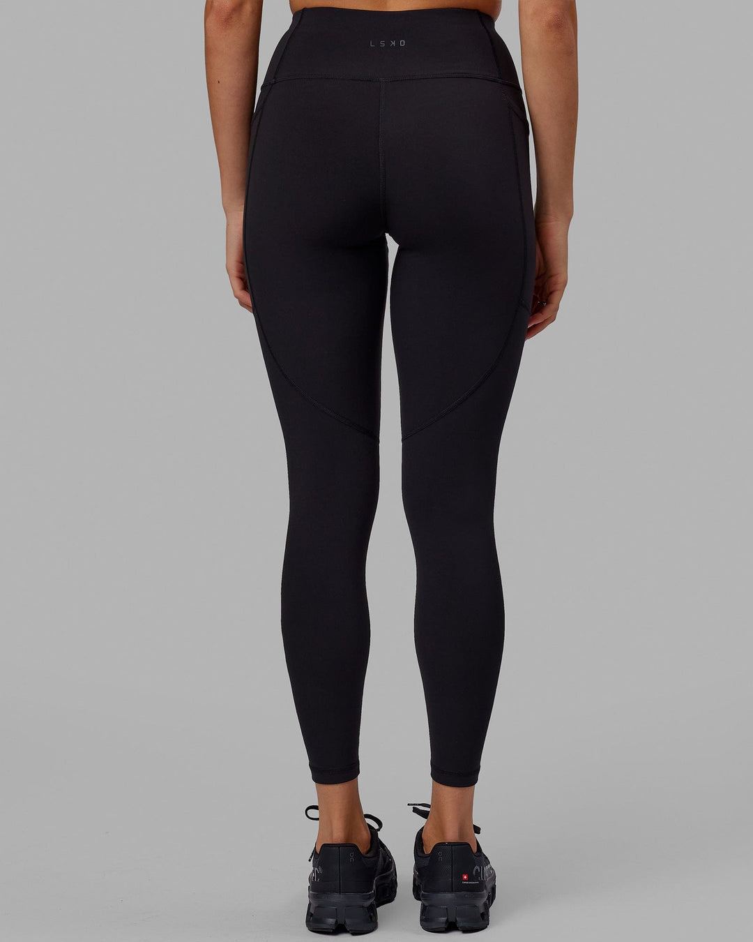 Woman wearing Rep Full Length Tight - Black-Neon Magenta