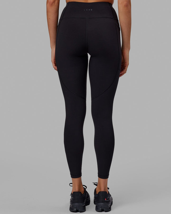 Woman wearing Rep Full Length Tight - Black-Neon Magenta