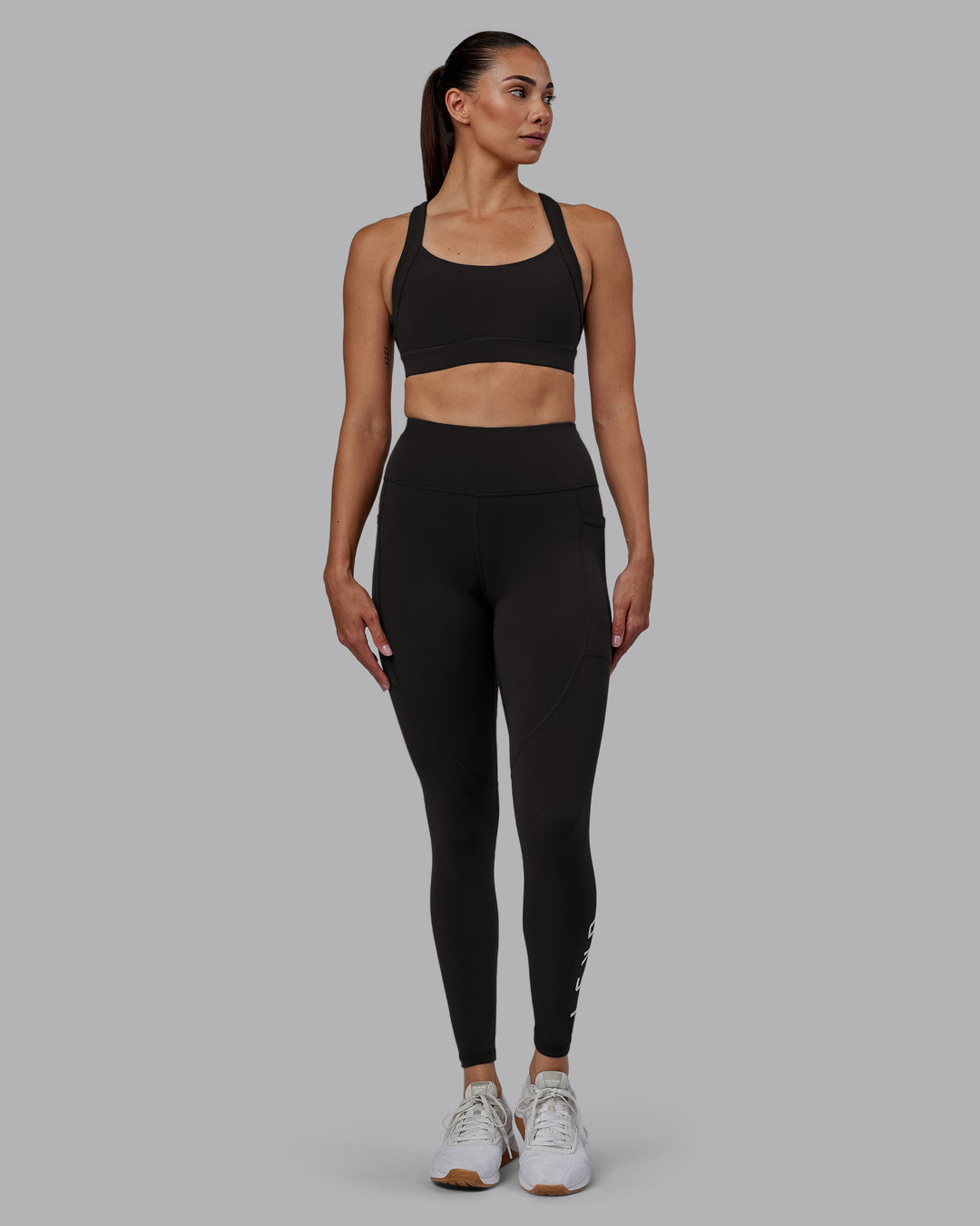 Woman wearing Rep Ultra High-Rise Full Length Legging Pockets - Pirate Black-White | Model:Blaize | Size:S