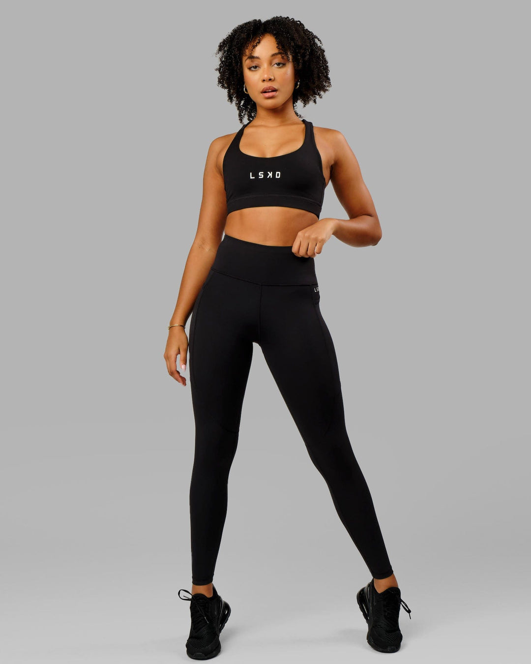Woman wearing Rep Full Length Tight Small Logo - Black-White
