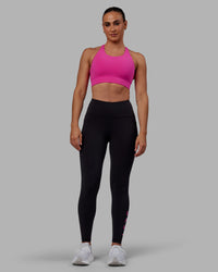 Woman wearing Rep Ultra High-Rise Full Length Legging Pockets - Black-Fuchsia Pink | Model:Sophie | Size:S