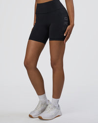 Woman wearing Rep Ultra High-Rise 6" Short Pockets - Black-Black | Model:Jordan | Size:S