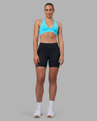 Woman wearing Rep Ultra High-Rise 6" Short Pockets - Black-Blue Atoll | Model:Sophie | Size:S