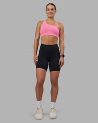 Woman wearing Rep Ultra High-Rise 6" Short Pockets - Black-Candy Pink | Model:Keisha | Size:S