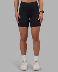 Woman wearing Rep Ultra High-Rise 6" Short Pockets - Black-Candy Pink | Model:Keisha | Size:S