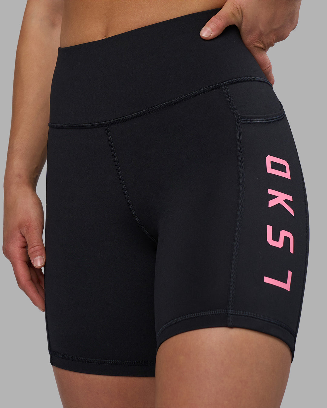 Woman wearing Rep Ultra High-Rise 6" Short Pockets - Black-Candy Pink | Model:Keisha | Size:S