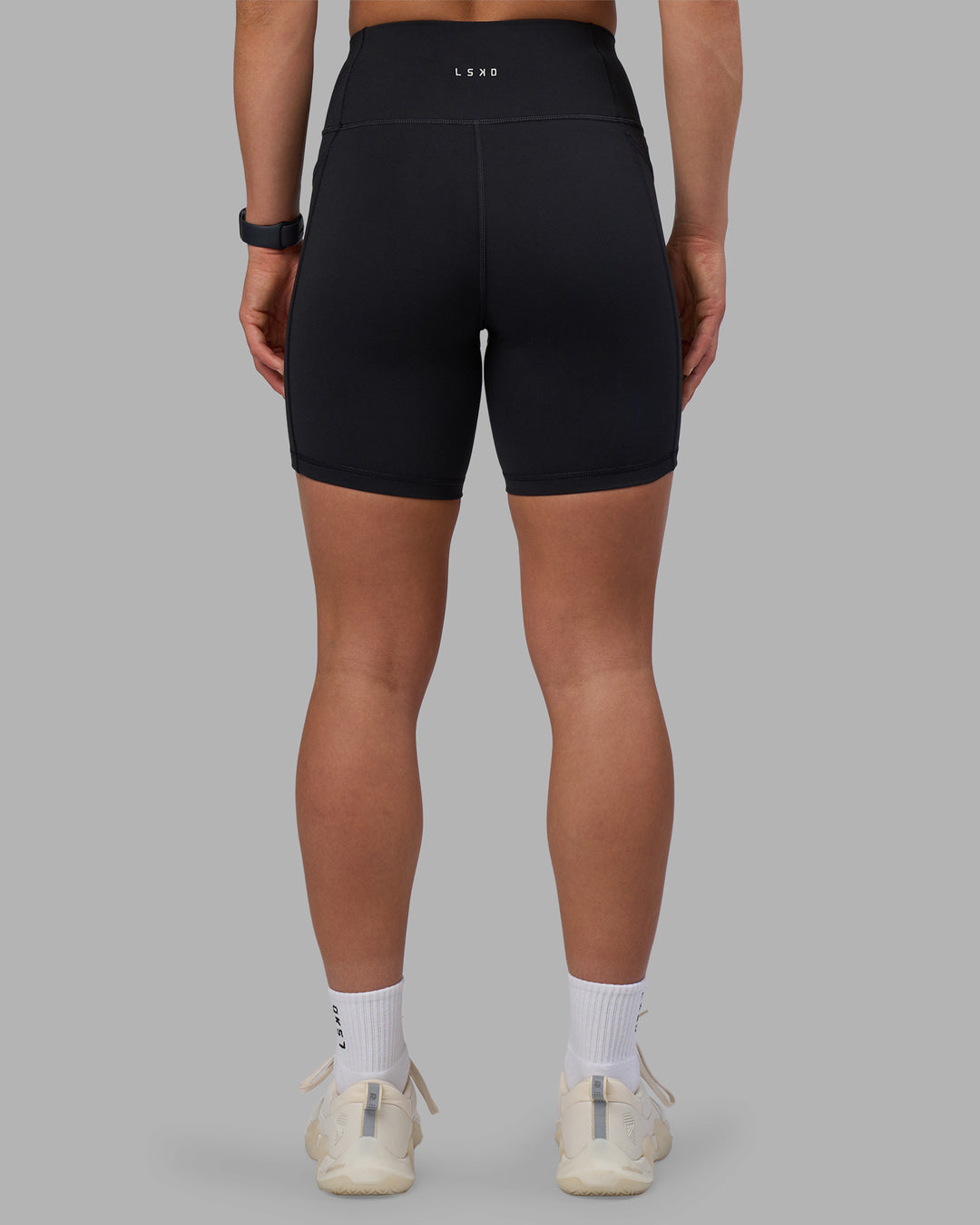 Woman wearing Rep Ultra High-Rise 6" Short Pockets - Black-Candy Pink | Model:Keisha | Size:S