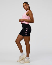 Woman wearing Rep Ultra High-Rise 6" Short Pockets - Black-Marshmallow | Model:Rosie | Size:S