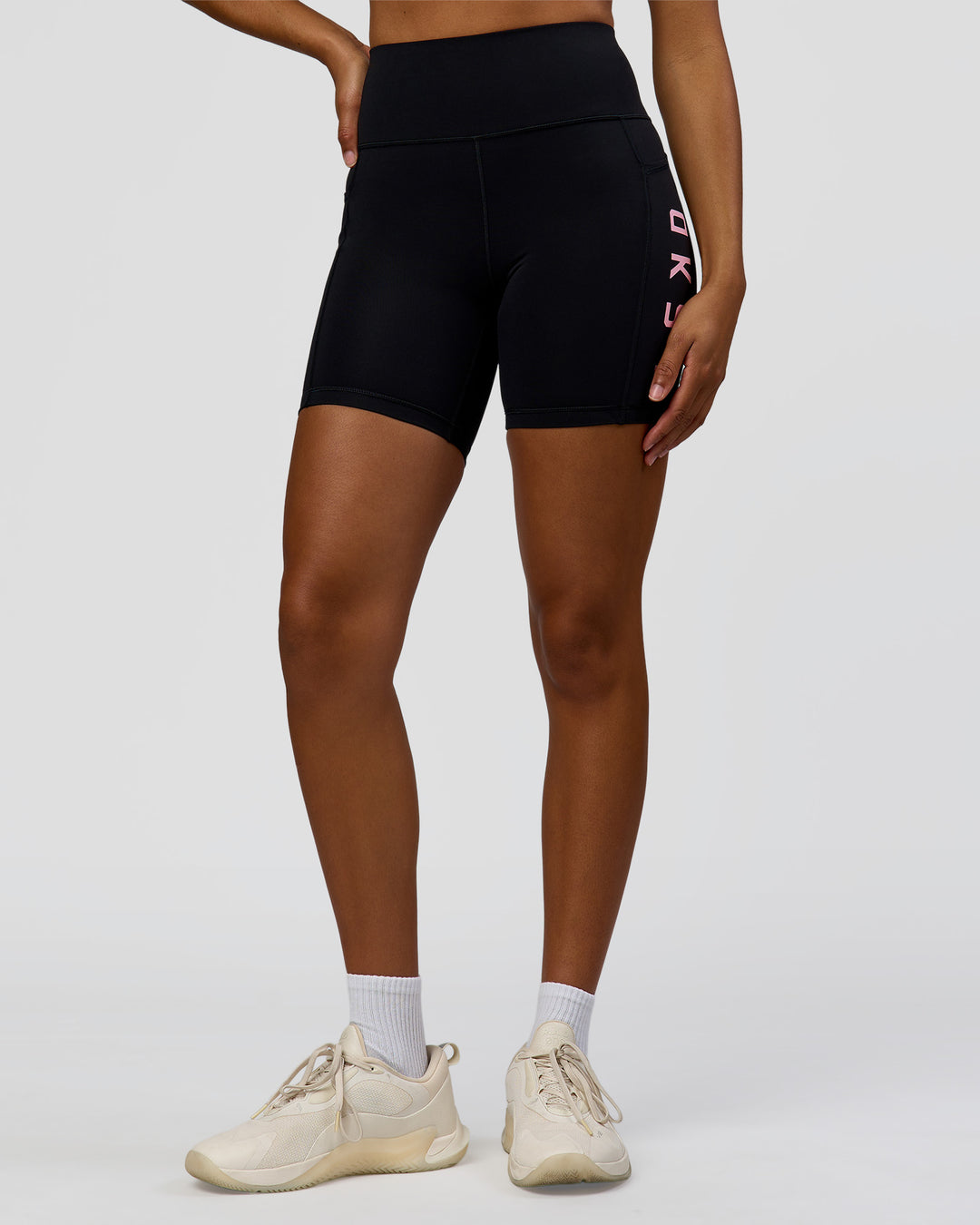 Woman wearing Rep Ultra High-Rise 6" Short Pockets - Black-Marshmallow | Model:Rosie | Size:S
