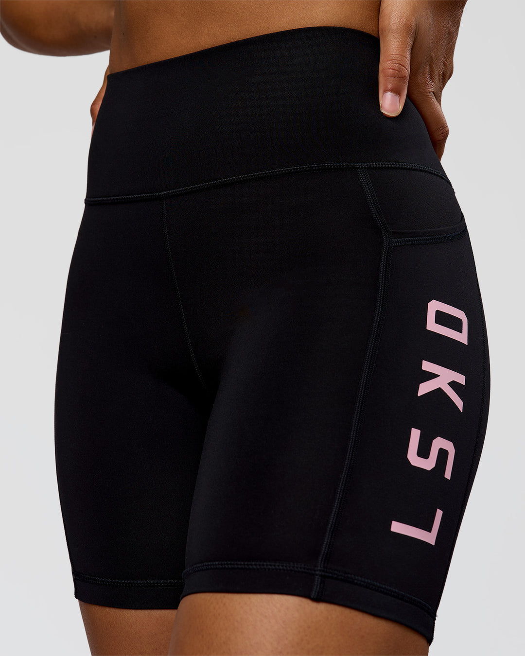 Woman wearing Rep Ultra High-Rise 6" Short Pockets - Black-Marshmallow | Model:Rosie | Size:S