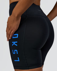 Woman wearing Rep Ultra High-Rise 6" Short Pockets - Black-Palace Blue | Model:Rosie | Size:S