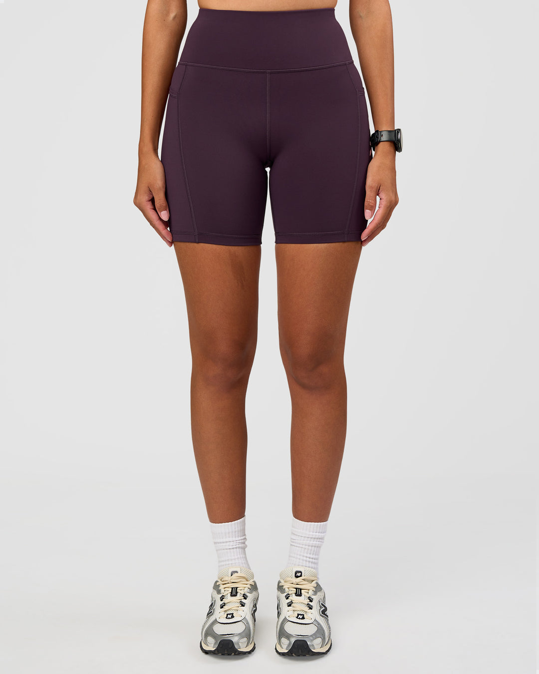Woman wearing Rep Ultra High-Rise 6" Short Pockets - Midnight Plum-Marshmallow | Model:Rhiley | Size:S