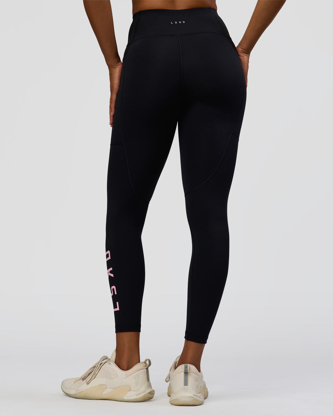 Woman wearing Rep Ultra High-Rise 7/8 Legging Pockets - Black-Marshmallow | Model:Rosie | Size:S