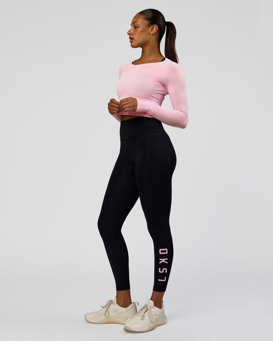 Woman wearing Rep Ultra High-Rise 7/8 Legging Pockets - Black-Marshmallow | Model:Rosie | Size:S