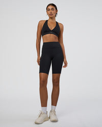 Woman wearing Rep Ultra High-Rise 9" Short Pockets - Black-Black | Model:Ruby | Size:S