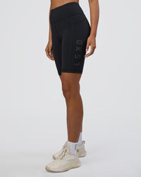 Woman wearing Rep Ultra High-Rise 9" Short Pockets - Black-Black | Model:Ruby | Size:S