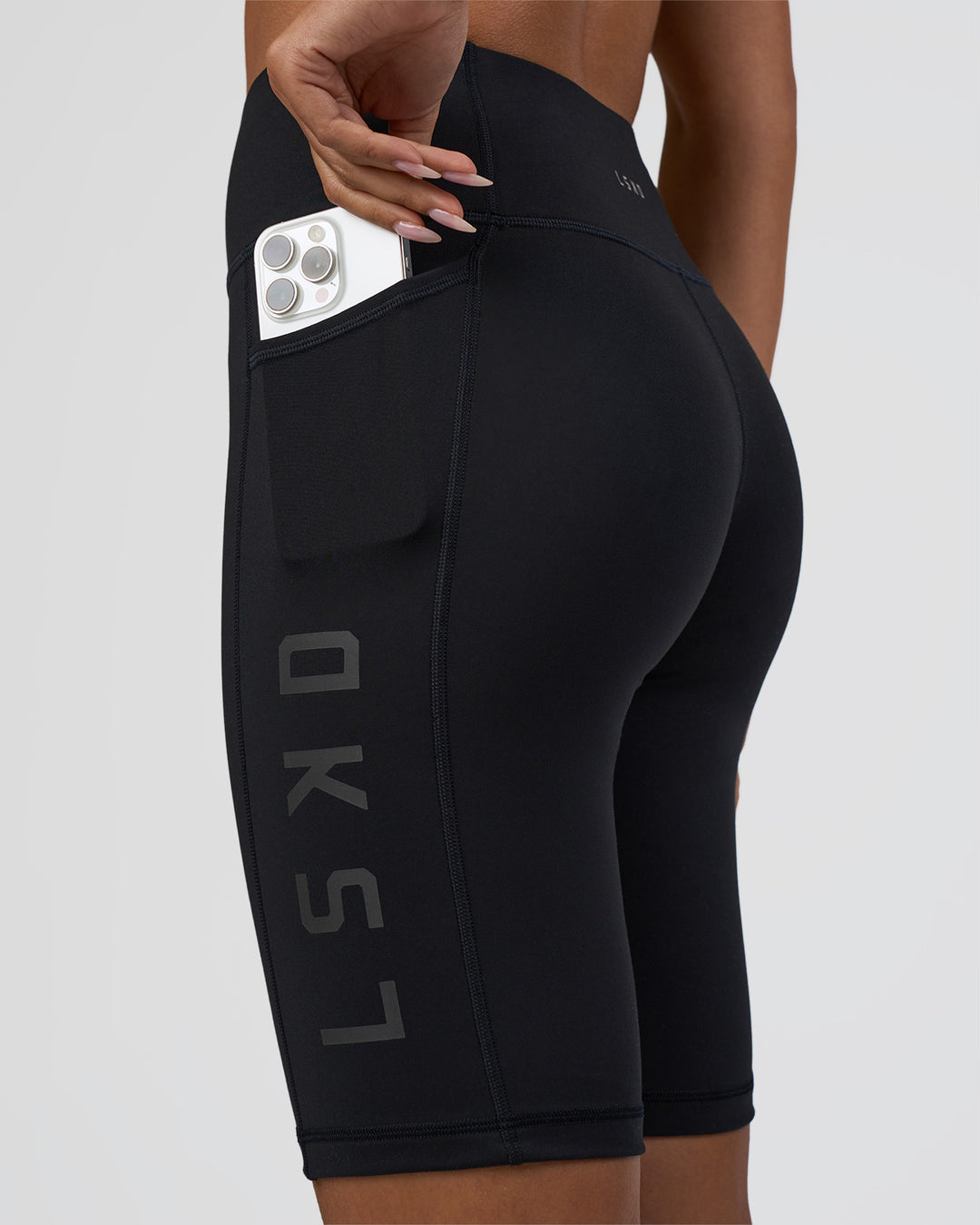 Woman wearing Rep Ultra High-Rise 9" Short Pockets - Black-Black | Model:Ruby | Size:S