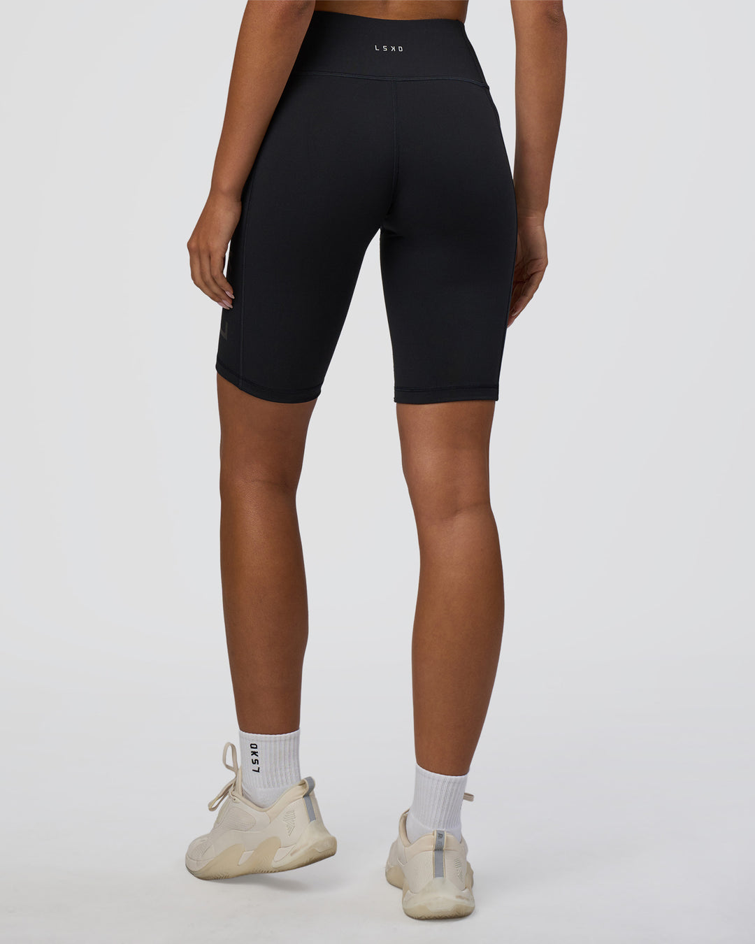 Woman wearing Rep Ultra High-Rise 9" Short Pockets - Black-Black | Model:Ruby | Size:S