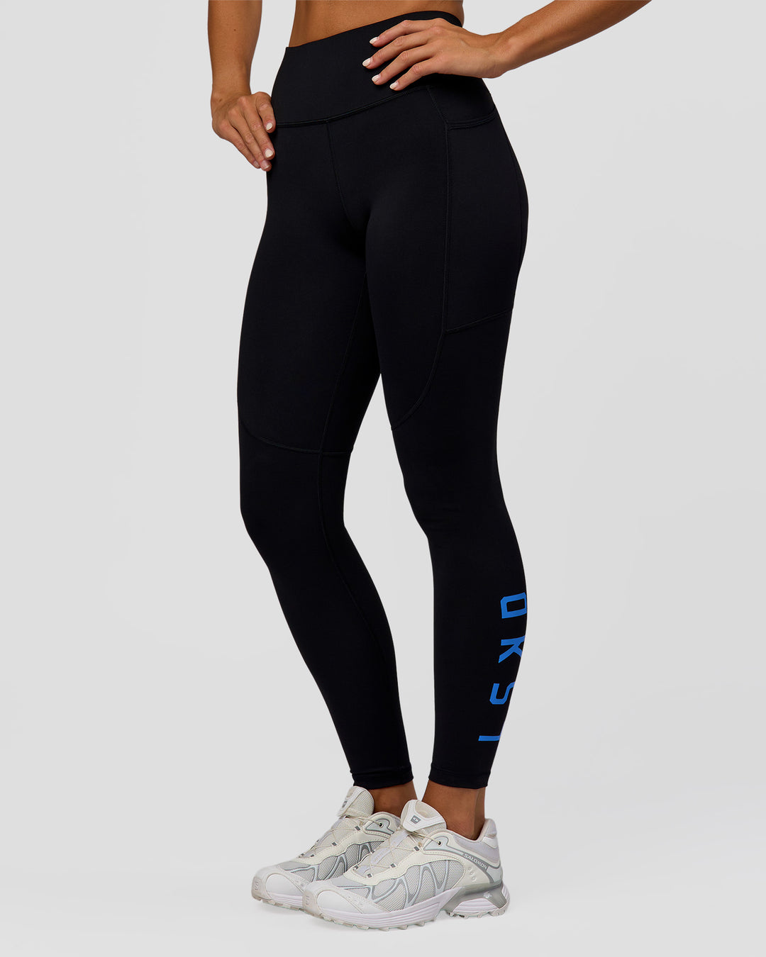 Woman wearing Rep Ultra High-Rise Full Length Legging Pockets - Black-Palace Blue | Model:Amity | Size:S