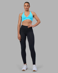 Woman wearing Rep Ultra High-Rise Full Length Legging Pockets - Black-Blue Atoll | Model:Sophie | Size:S