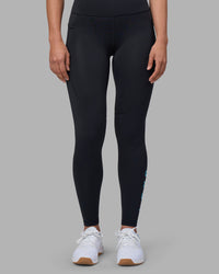 Woman wearing Rep Ultra High-Rise Full Length Legging Pockets - Black-Blue Atoll | Model:Sophie | Size:S