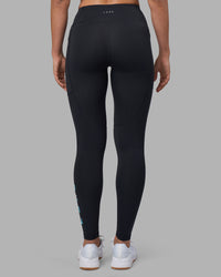 Woman wearing Rep Ultra High-Rise Full Length Legging Pockets - Black-Blue Atoll | Model:Sophie | Size:S