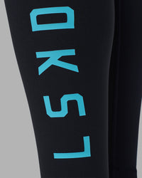 Woman wearing Rep Ultra High-Rise Full Length Legging Pockets - Black-Blue Atoll | Model:Sophie | Size:S