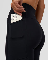 Woman wearing Rep Ultra High-Rise Full Length Legging Pockets - Black-Marshmallow | Model:Amity | Size:S