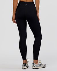 Woman wearing Rep Ultra High-Rise Full Length Legging Pockets - Black-Marshmallow | Model:Amity | Size:S