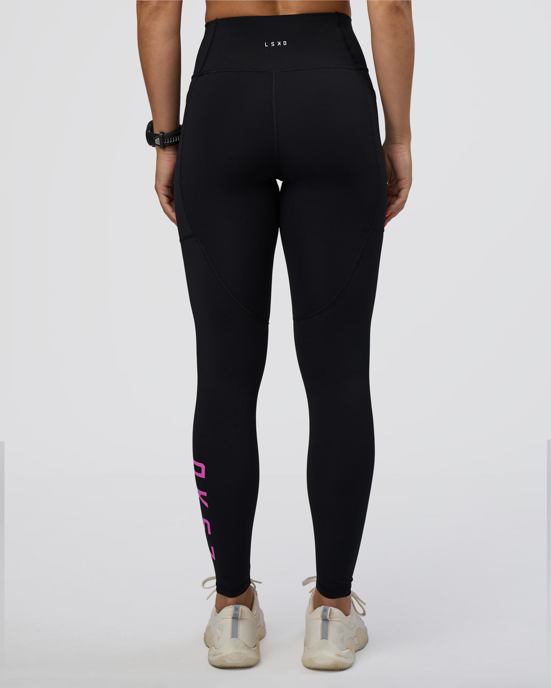 Woman wearing Rep Ultra High-Rise Full Length Legging Pockets - Black-Ultra Fuchsia | Model:Abbey | Size:S