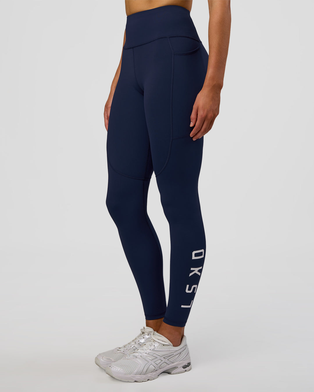 Woman wearing Rep Ultra High-Rise Full Length Legging Pockets - Future Navy-White | Model:Evie | Size:S