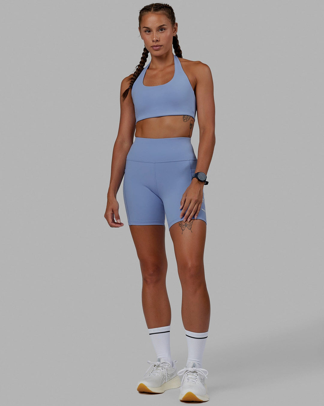 Woman wearing Rep Mid Short Tight - Arctic Blue-White
