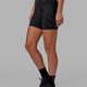 Woman wearing Rep Mid Short Tight - Black-Camo