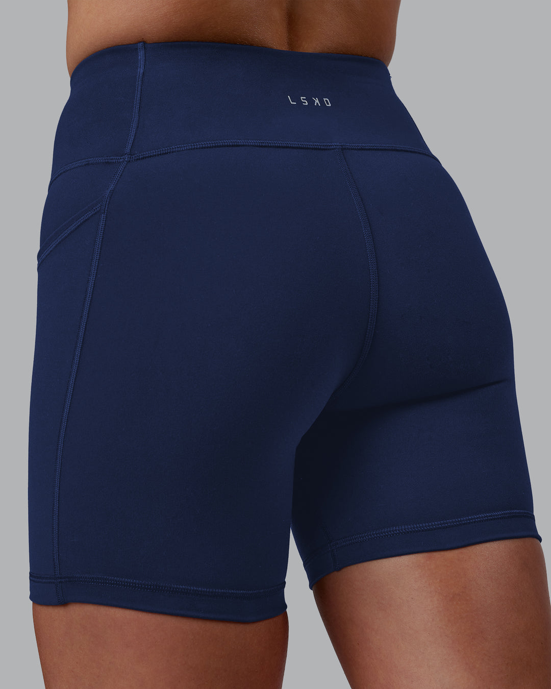 Woman wearing Rep Ultra High-Rise 6&quot; Short Pockets No Logo - Future Navy | Model:Shae | Size:S