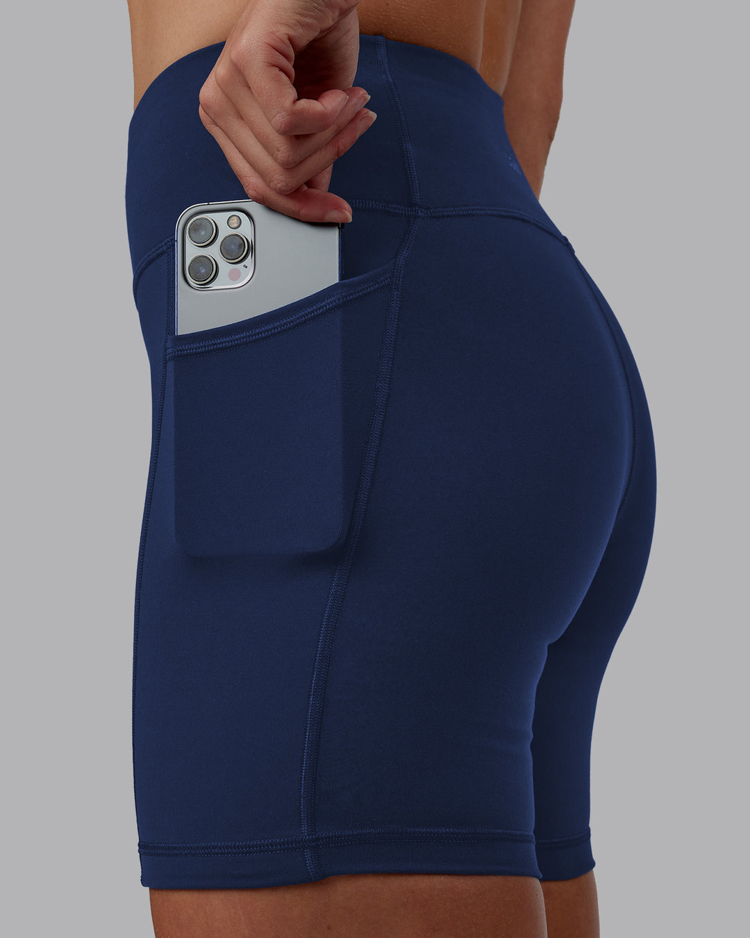 Woman wearing Rep Ultra High-Rise 6&quot; Short Pockets No Logo - Future Navy | Model:Shae | Size:S