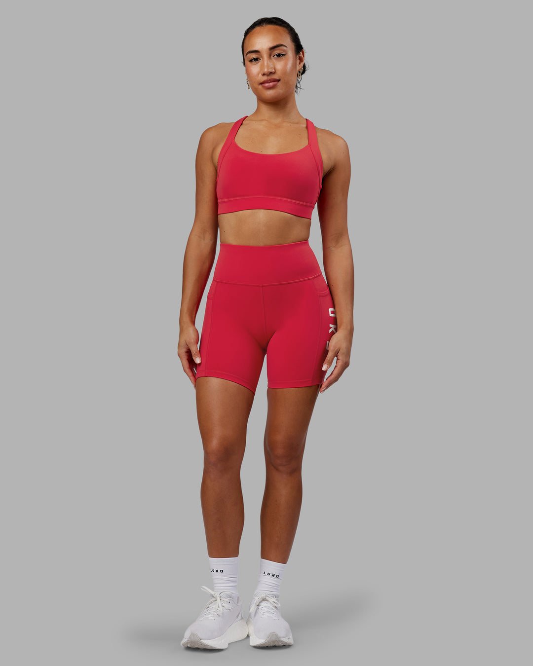 Woman wearing Rep Ultra High-Rise 6&quot; Short Pockets - Scarlet-White | Model:Demi | Size:S
