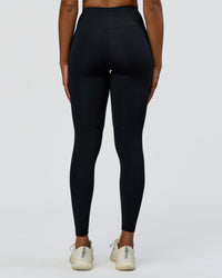 Woman wearing Rep Street Script Ultra High-Rise Full Length Legging Pockets - Black-White | Model:Rosie | Size:S