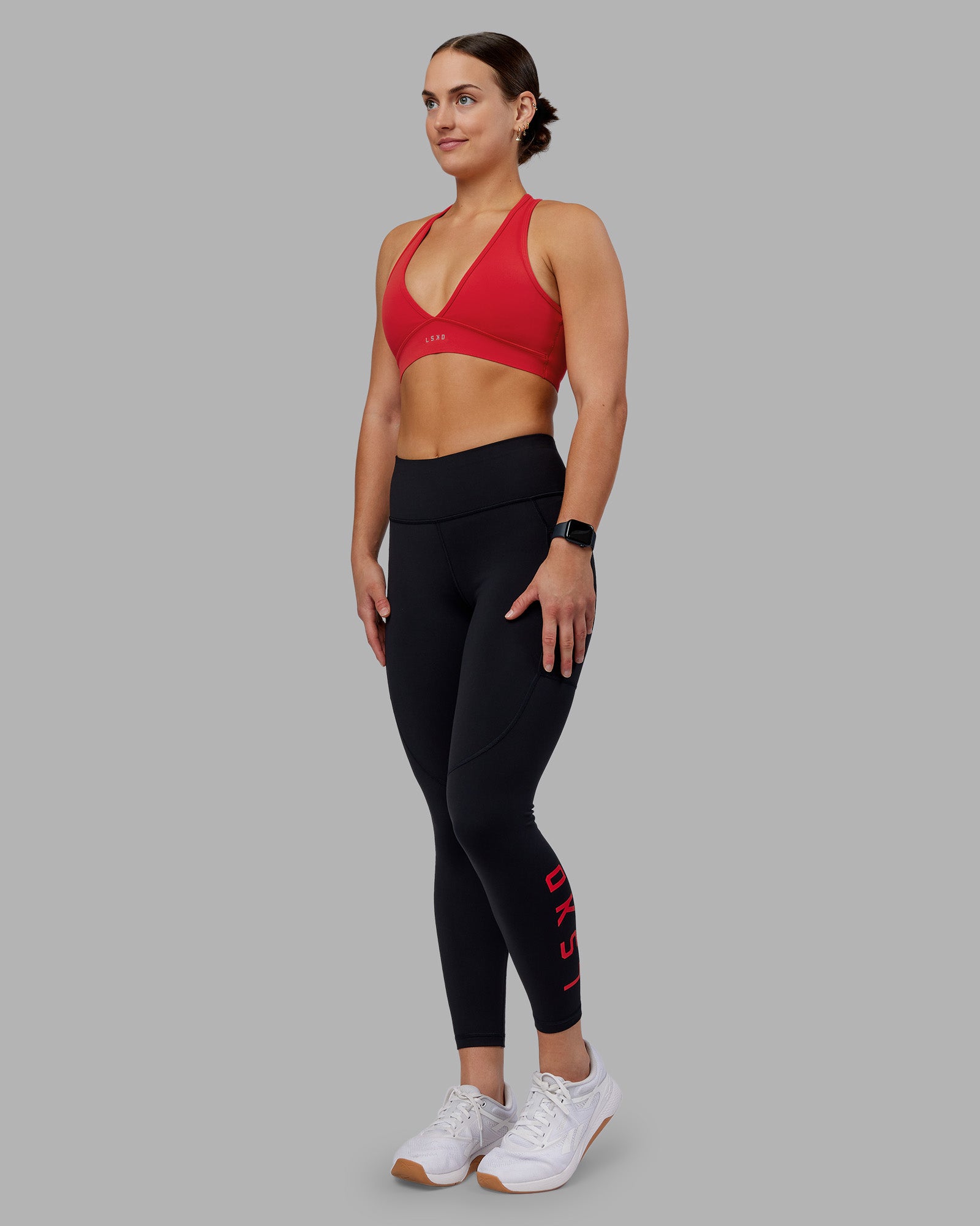 Woman wearing Rep Ultra High-Rise 7/8 Legging Pockets - Black-Scarlet | Model:Keisha | Size:S