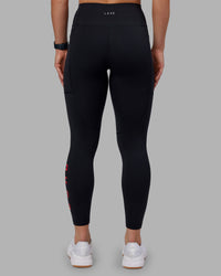 Woman wearing Rep Ultra High-Rise 7/8 Legging Pockets - Black-Scarlet | Model:Keisha | Size:S