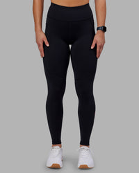 Woman wearing Rep Ultra High-Rise Full Length Legging Pockets - Black-Scarlet | Model:Keisha | Size:S