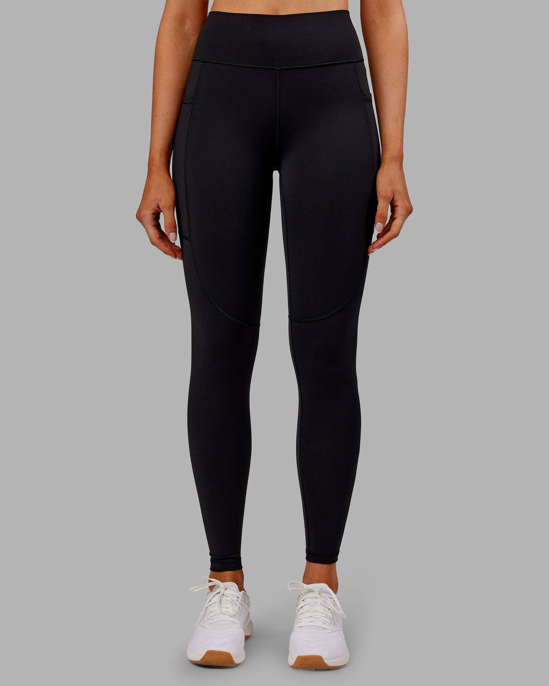 Woman wearing Rep Ultra High-Rise Full Length Legging Pockets - Black-Ultra Orange | Model:Ella | Size:S