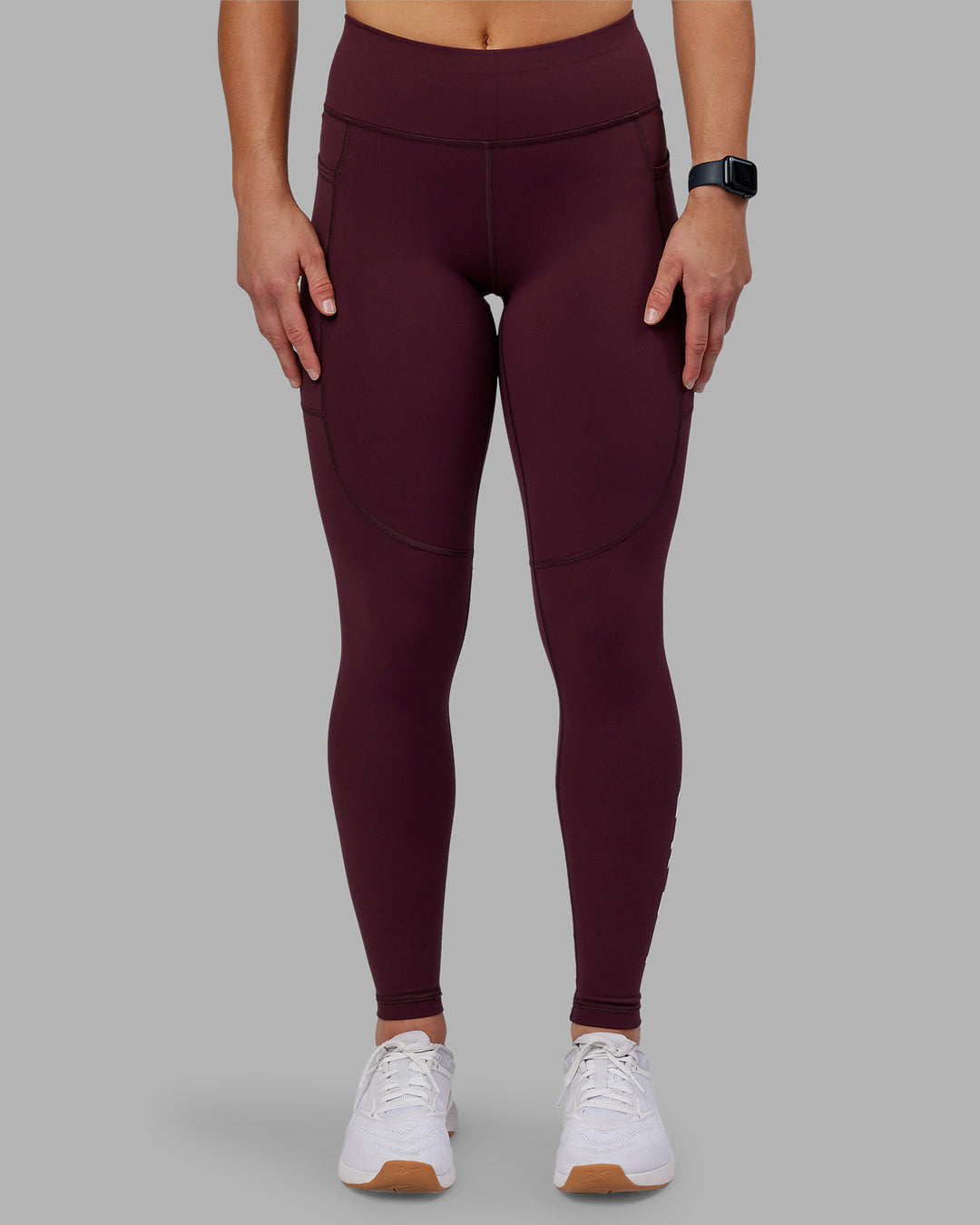 Woman wearing Rep Ultra High-Rise Full Length Legging Pockets - Cherry Lacquer-White | Model:Keisha | Size:S